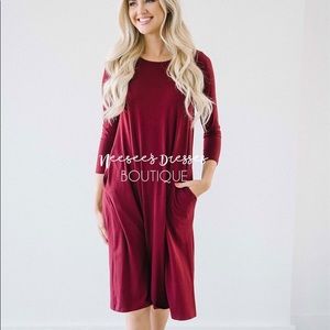 Brand new beautiful burgundy dress with pockets!